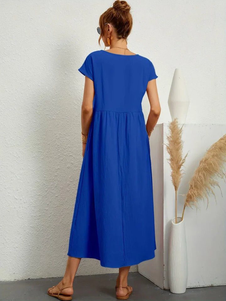 Gabrielle™ | A flowing midi dress with timeless elegance