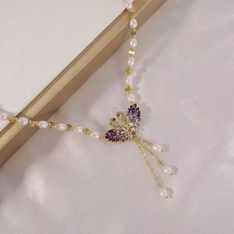 Necklace with Double Swan Pendant in Purple
